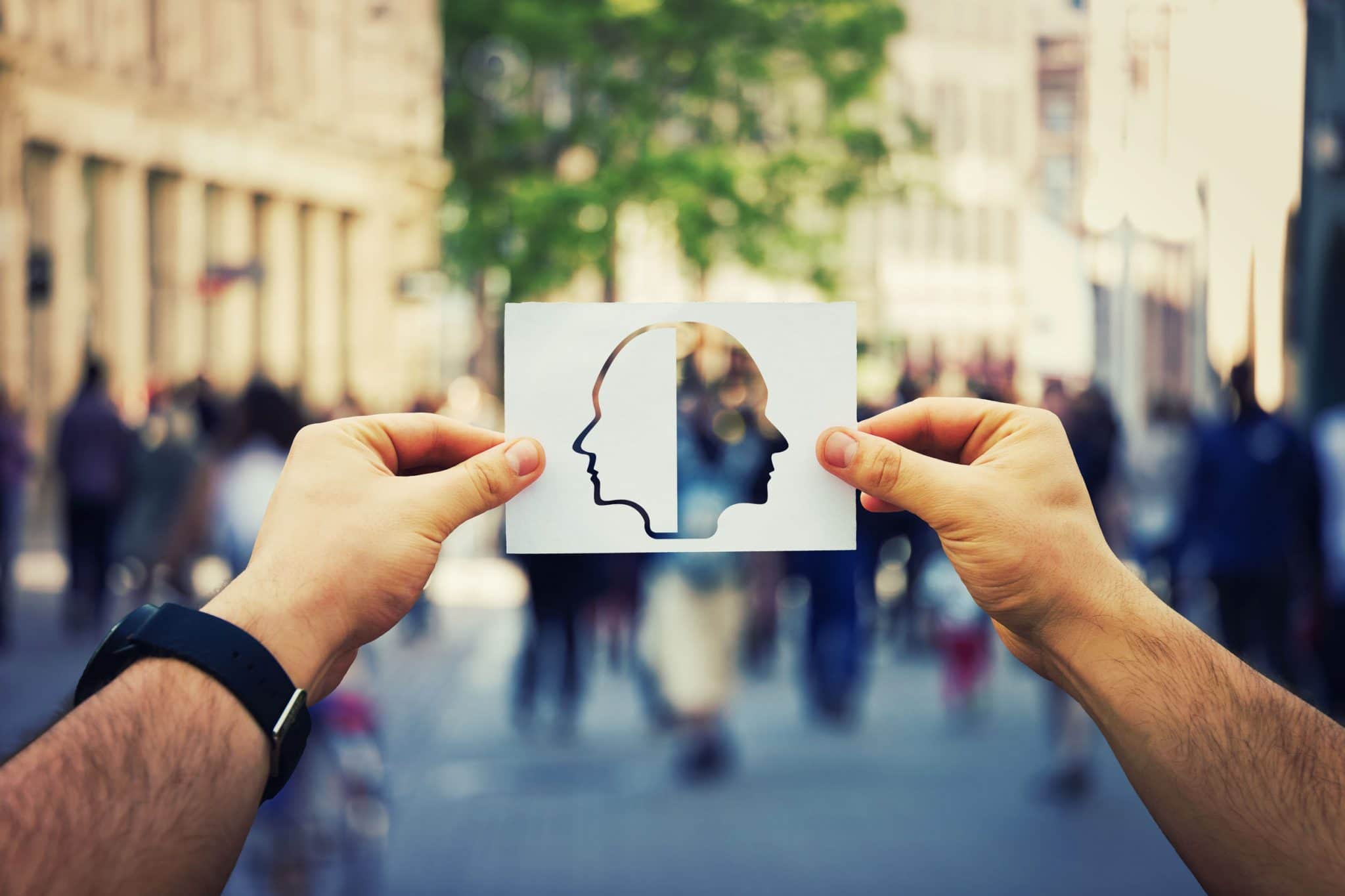 A man viewing the world through a bipolar disorder (BD) cutout